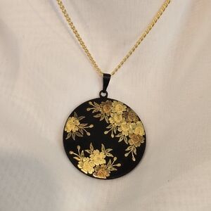 Elegant Black and Gold Floral Pendant Necklace